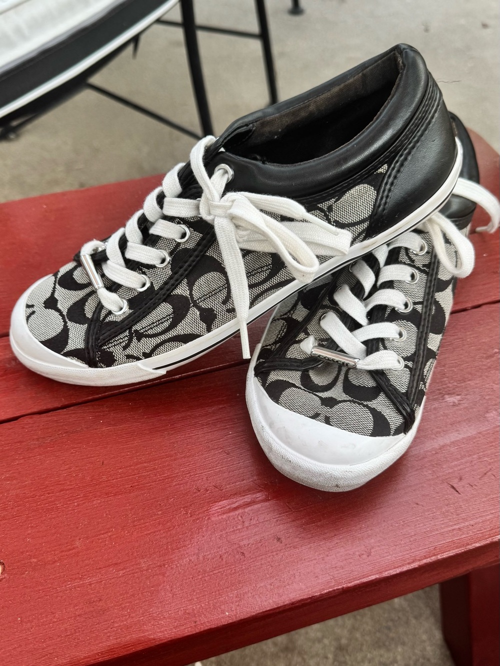 Coach women’s Black and White Signature Canvas Sneakers
